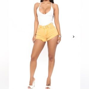Fashion nova vacay high waist denim stuff shorts in gold. NWT. Retail 32.99